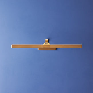 Larger Marcel cordless picture light in antique brass finish