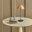 Twinky cordless table lamp in black with an antiqued brass hood
