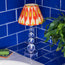 Tiny Aurora cordless table lamp in clear