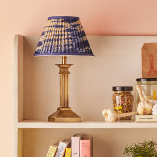 Freya cordless table lamp in antiqued brass