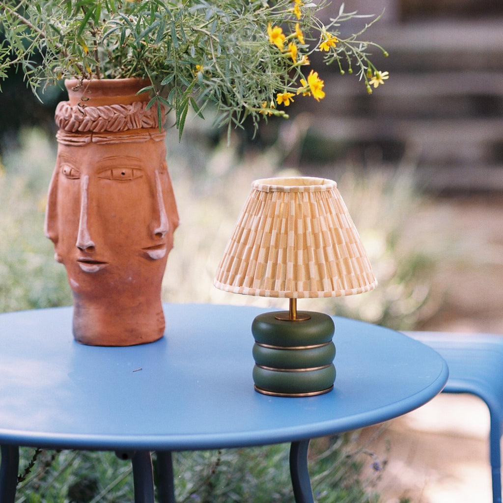 Holleder cordless table lamp in Moss by the Novogratz