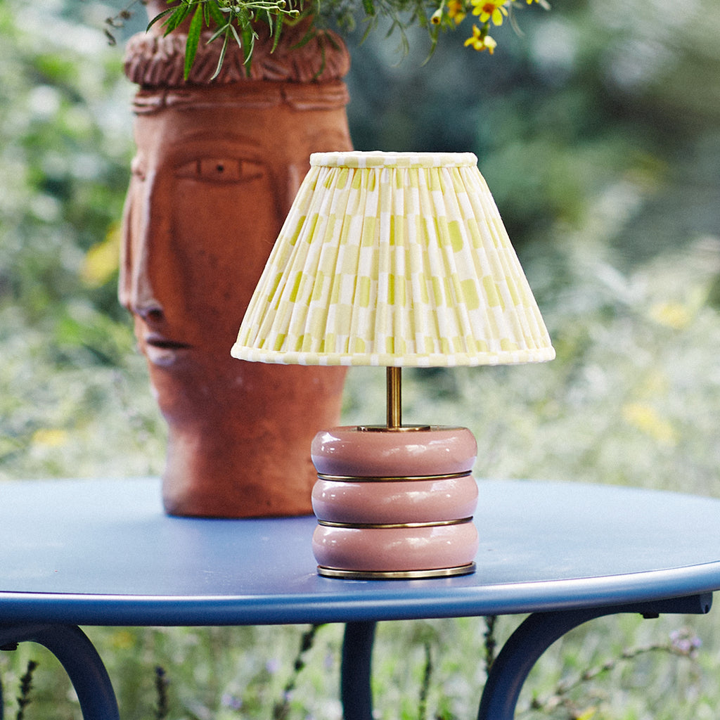 Holleder cordless table lamp in Blush by the Novogratz
