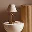 Phileas cordless table lamp in antiqued brass by Matthew Williamson