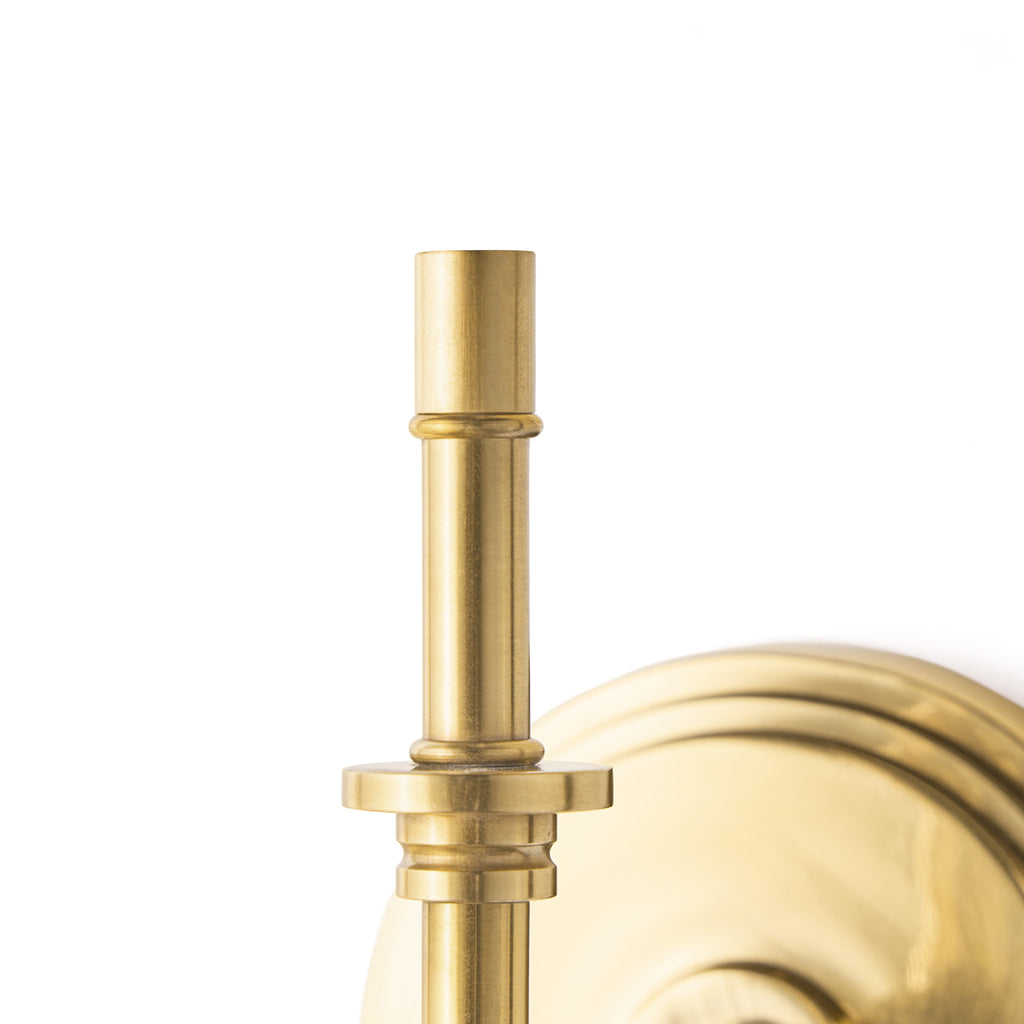 Single Chukka cordless wall fixture in antique brass