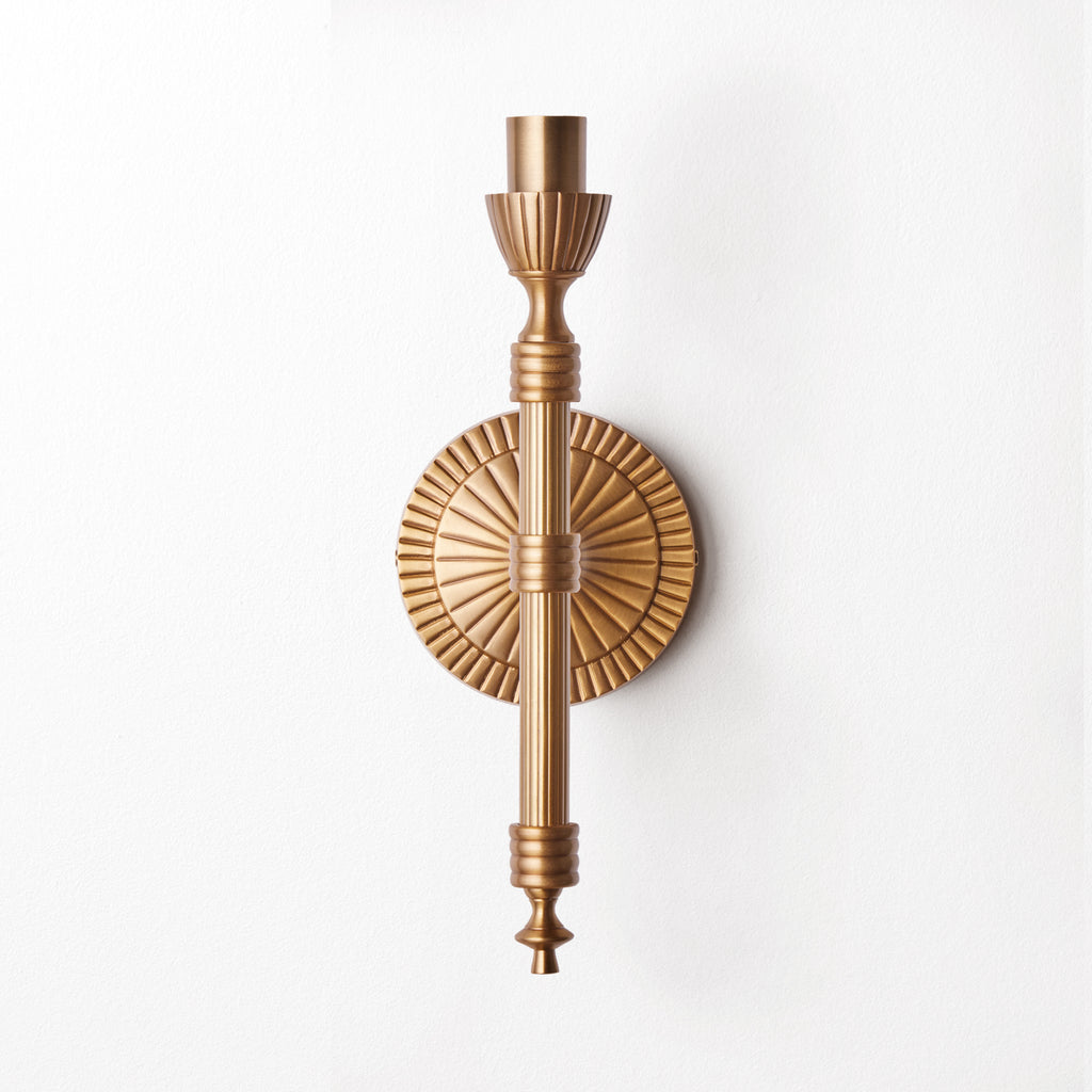 Wrappling wall fixture in antiqued brass