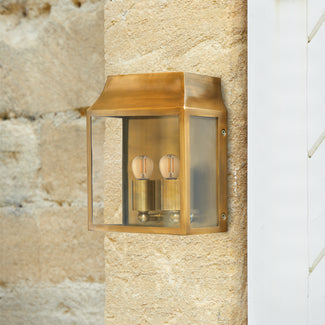 Smaller Double Crail wall sconce antique brass