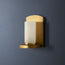 Roly wall sconce in antiqued brass with an alabaster tube