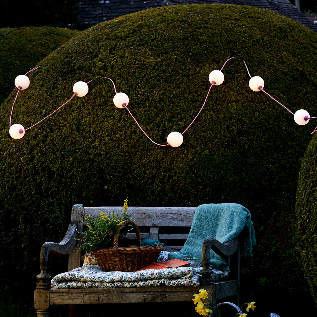 Heidi solar string lights in blush by the Novogratz