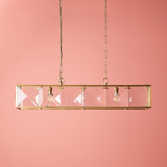 Hunza chandelier in prismatic glass and antiqued brass
