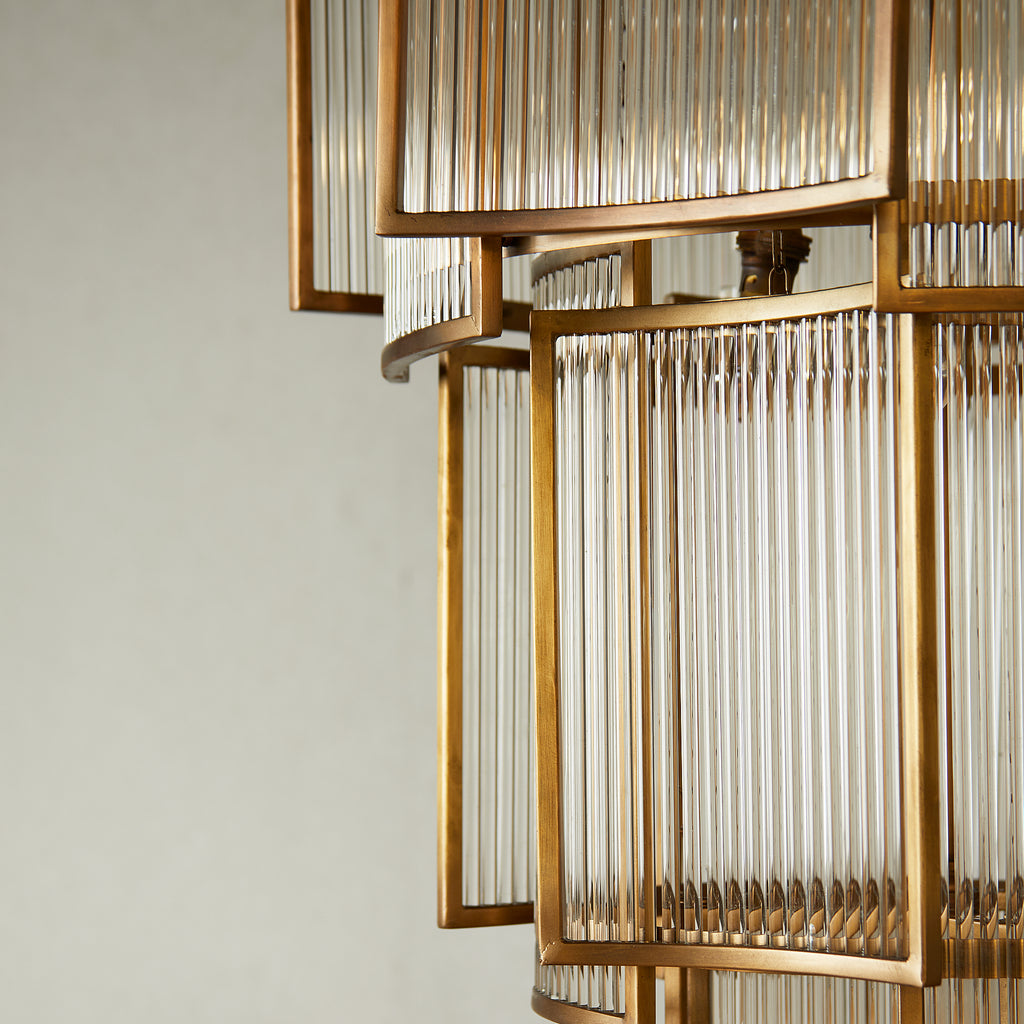 Zeus Chandelier in antiqued brass with glass rods