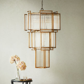 Zeus Chandelier in antiqued brass with glass rods