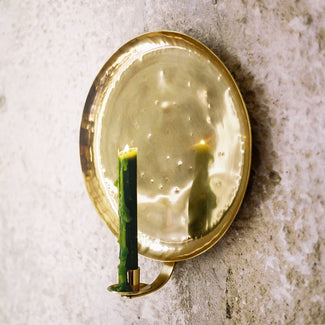 Bellamy candle sconce in brass by the Novogratz