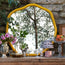 Brandy mirror in sand by the Novogratz