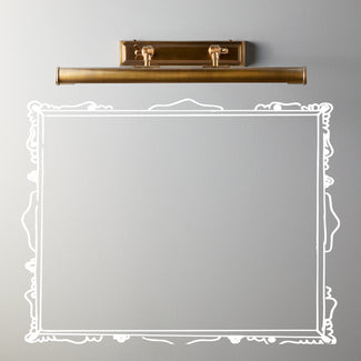 Double arm Pitcheroo picture light in antiqued brass