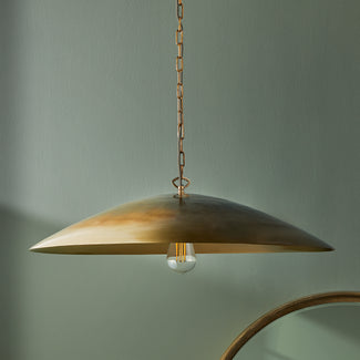 Supermoon pendant light in antiqued brass