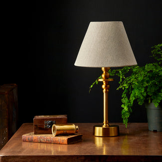 Phileas cordless table lamp in antiqued brass by Matthew Williamson