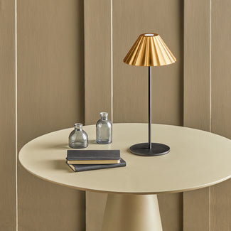 Twinky cordless table lamp in black with an antiqued brass hood
