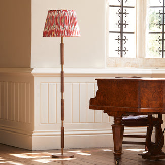 Skellig floor lamp in burnt wood and antiqued brass