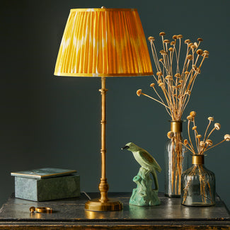 Chukka table lamp in antiqued brass