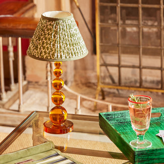 Tiny Aurora cordless table lamp in amber