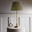 Chukka cordless table lamp in antique brass