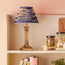 Freya cordless table lamp in antiqued brass
