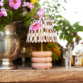 Holleder cordless table lamp in Blush by the Novogratz