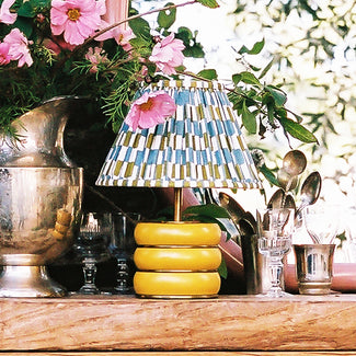 Holleder cordless table lamp in Sand by the Novogratz