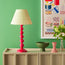 Lillee cordless table lamp in hot pink lacquered wood