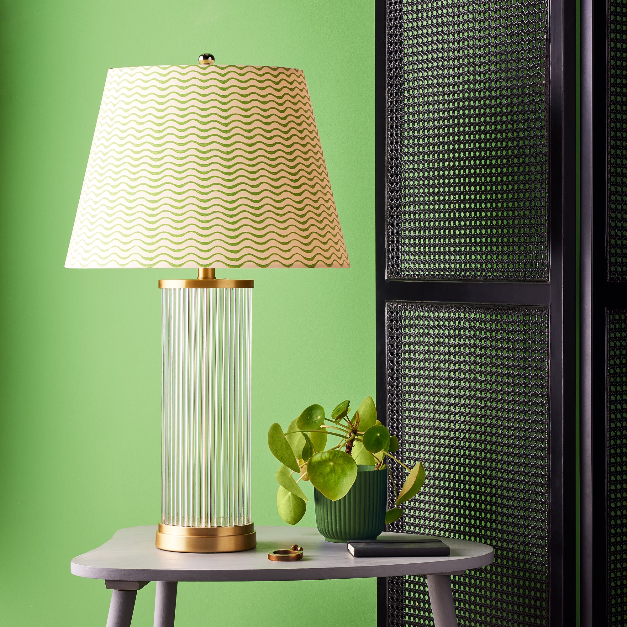 Roddy table lamp in antiqued brass with glass rods