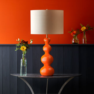 Smaller Wobster table lamp in orange lacquered wood