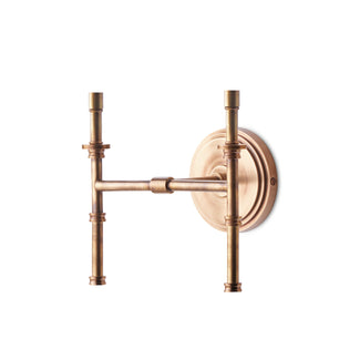 Double Chukka cordless wall fixture in antique brass