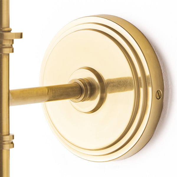 Single Chukka cordless wall fixture in antique brass