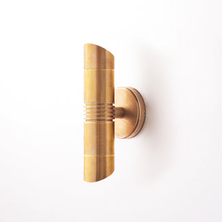 Blythe up and down wall sconce in antiqued brass