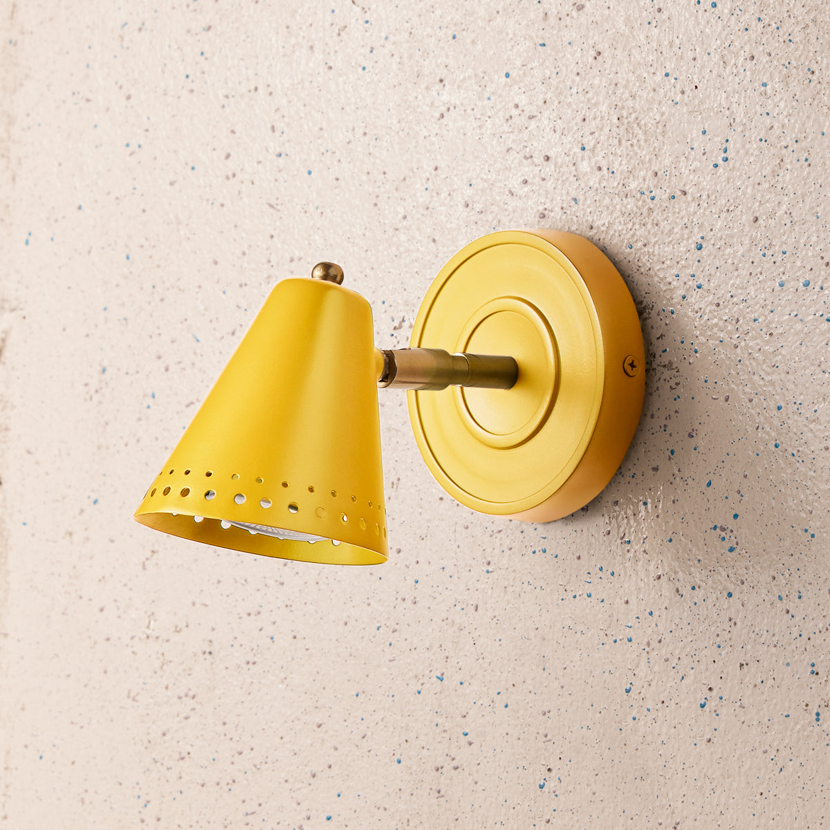 Brandy wall sconce in Sand by the Novogratz