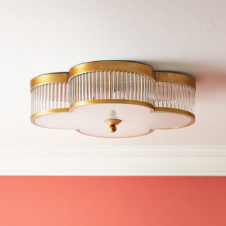 Clover flush mount ceiling light in antiqued brass with glass rods