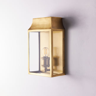 Crail wall sconce in antiqued brass