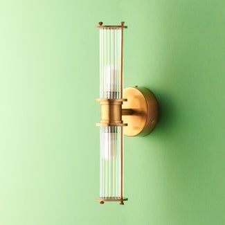 Larger Hunter wall sconce in antiqued brass and glass