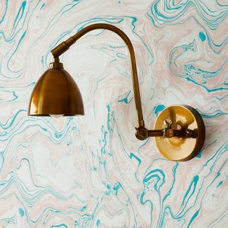 Jasmine wall sconce in antiqued Brass