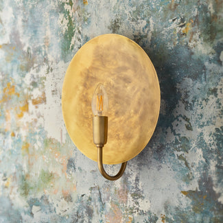 Larger Moon wall sconce in antiqued brass