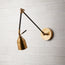 Pick wall sconce in black and antiqued brass