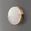 Plato wall sconce in alabaster and antiqued brass