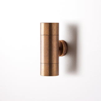 Regular Portreath exterior wall sconce in antiqued brass