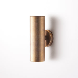 Larger Portreath exterior wall sconce in antiqued brass