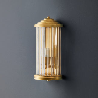 Baby Roddy wall sconce in antiqued brass