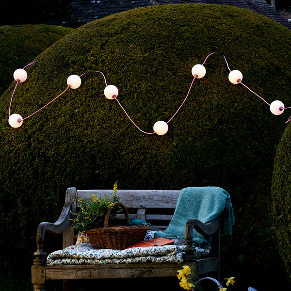 Heidi solar string lights in moss by the Novogratz