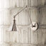 Stork wall sconce in antiqued silver