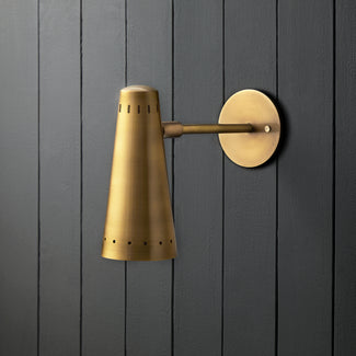Vincent wall sconce in antiqued brass